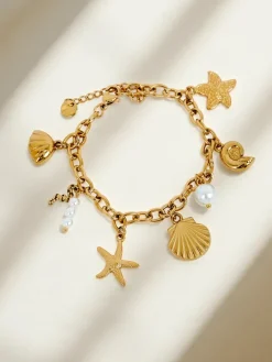 Biżuteria^Royalfashion Bransoletka Aphrodite Maretta pozłacana z zawieszkami morskimi i perełką