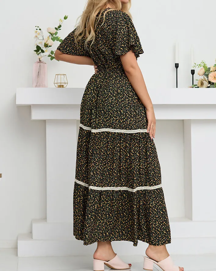 Sukienki Letnie|Sukienki Długie^Royalfashion Czarna rozkloszowana damska sukienka maxi w kwiaty - Odzież czarny