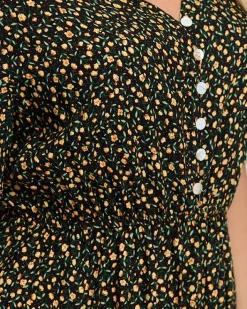 Sukienki Letnie|Sukienki Długie^Royalfashion Czarna rozkloszowana damska sukienka maxi w kwiaty - Odzież czarny