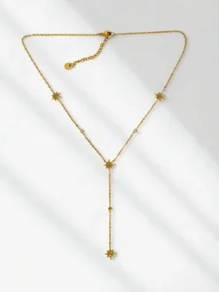 Biżuteria^Royalfashion Naszyjnik Lariat Stella Aurelia pozłacany z motywem gwiazd