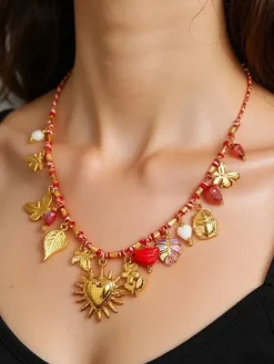 Biżuteria^Royalfashion Naszyjnik pozłacany Calista Charmella z zawieszkami z żywicy