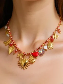 Biżuteria^Royalfashion Naszyjnik pozłacany Calista Charmella z zawieszkami z żywicy