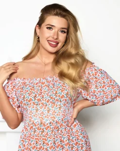 Sukienki Letnie|Sukienki Długie^Royalfashion Pomarańczowo- biała sukienka maxi z kwiatowym wzorem- Odzież biały