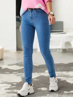 Jeansy^Royalfashion Bawełniane jeansy damskie zwężane