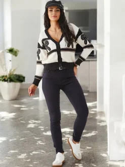 Jeansy^Royalfashion Bawełniane jeansy damskie typu rurki Granatowy