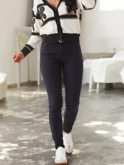 Jeansy^Royalfashion Bawełniane jeansy damskie typu rurki Granatowy