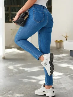 Jeansy^Royalfashion Bawełniane jeansy damskie typu rurki