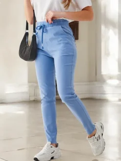 Legginsy / Tregginsy^Royalfashion Bawełniane spodnie typu tregginsy damskie Ecru