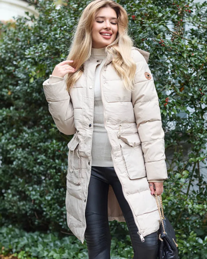 Kurtki / Marynarki / Płaszcze^Royalfashion Beżowa damska długa kurtka zimowa z syntetycznym ociepleniem beżowy