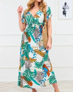 Sukienki Letnie|Sukienki Długie^Royalfashion Biała damska długa sukienka z kolorowym roślinnym wzorem biały