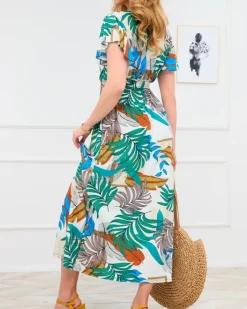 Sukienki Letnie|Sukienki Długie^Royalfashion Biała damska długa sukienka z kolorowym roślinnym wzorem biały