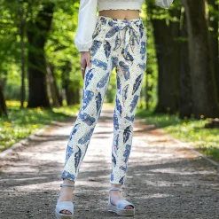 Legginsy / Tregginsy^Royalfashion Białe damskie tregginsy w piórka biały