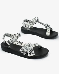 Sandały Płaskie^Royalfashion Białe sandały damskie z kokardką Oyall biały