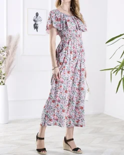 Kombinezony^Royalfashion Biało- długi kombinezon damski w kwiaty różowy