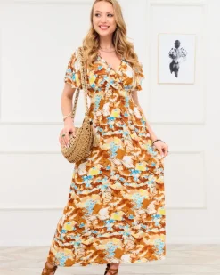 Sukienki Letnie|Sukienki Długie^Royalfashion Brązowa damska długa sukienka z modnym wzorem brązowy