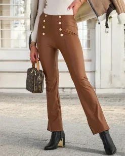 Eko Skórzane|Legginsy / Tregginsy^Royalfashion Brązowe damskie eko-skórzane legginsy ze złotymi guzikami brązowy