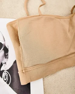 Sportowe^Royalfashion Damski biustonosz sportowy beżowy