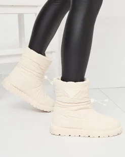 Śniegowce^Royalfashion Damskie owe pikowane buty a'la śniegowce na płaskiej podeszwie Ferri krem