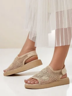 Sandały Płaskie^Royalfashion Damskie sandały ażurowe z cholewką Levay beżowy