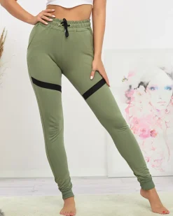 Spodnie Dresowe^Royalfashion Damskie spodnie dresowe w kolorze m zielony