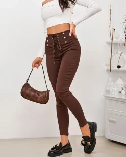 Legginsy / Tregginsy^Royalfashion Damskie spodnie typu tregginsy z ozdobnym wiązaniem brązowy