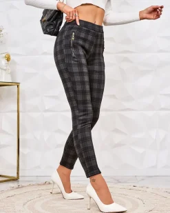 Legginsy / Tregginsy^Royalfashion Damskie spodnie typu tregginsy z ociepleniem w kratę czarny