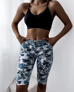 Spodenki 3/4|Krótkie Spodenki^Royalfashion Damskie spodenki 3/4 w m kolorze i w kwiaty biały