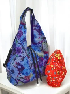 Materiałowe^Royalfashion Duża torba materiałowa w kwiaty z kosmetyczką i zapięciem na magnes Wielokolorowe