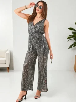 Kombinezony^Royalfashion Długi kombinezon damski z cekinami srebrny