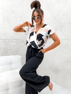 Kombinezony^Royalfashion Długi kombinezon damski z printem czarny