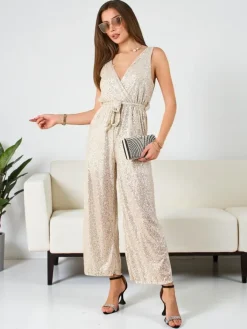 Kombinezony^Royalfashion Długi kombinezon damski z cekinami krem