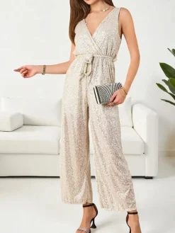 Kombinezony^Royalfashion Długi kombinezon damski z cekinami krem