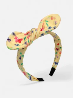 Akcesoria Do Włosów^Royalfashion Dziecięca opaska do włosów z kokardką z printem żółty