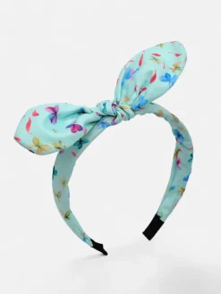 Akcesoria Do Włosów^Royalfashion Dziecięca opaska do włosów z kokardką z printem mięta