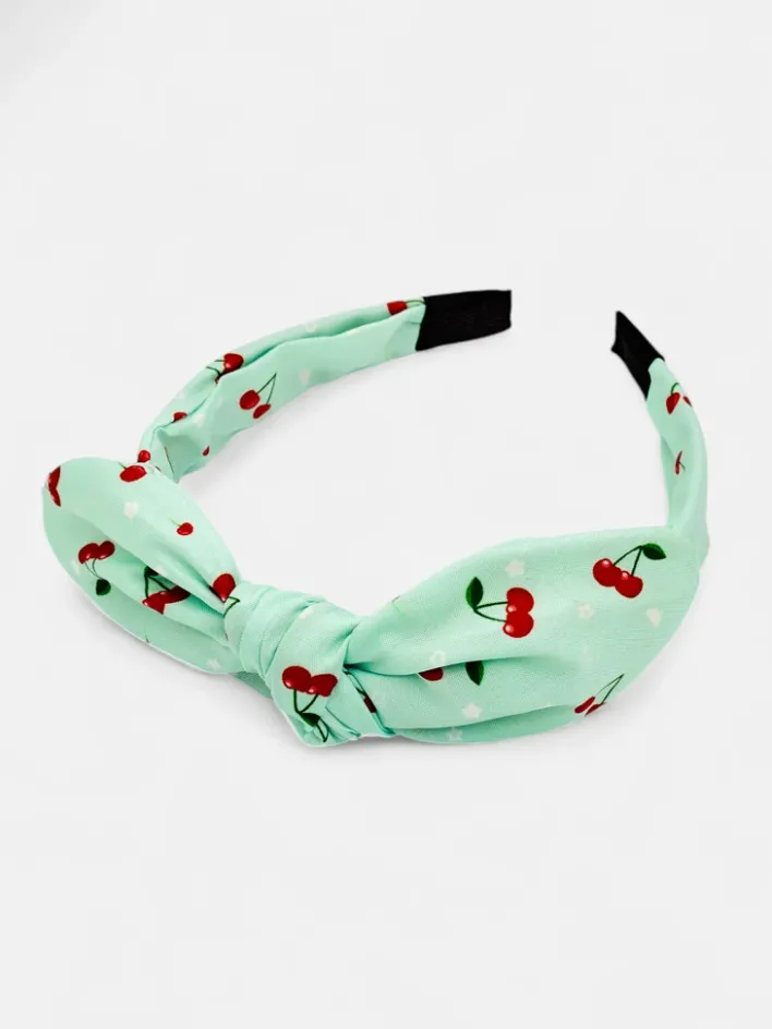 Akcesoria Do Włosów^Royalfashion Dziecięca opaska do włosów z kokardką z printem w wisienki mięta