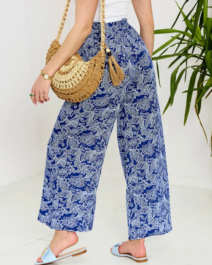 Spodnie Materiałowe^Royalfashion Granatowe damskie spodnie materiałowe z printem Granatowy