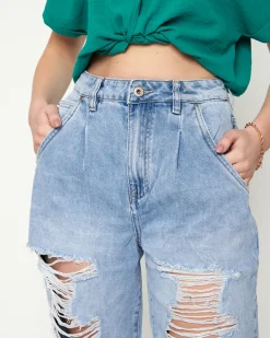 Jeansy^Royalfashion Jasnoniebieskie damskie spodnie jeansowe z dziurami