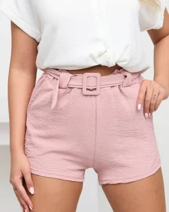 Szorty|Krótkie Spodenki^Royalfashion Jasnoróżowe damskie krótkie spodenki z kieszeniami Jasnoróżowy