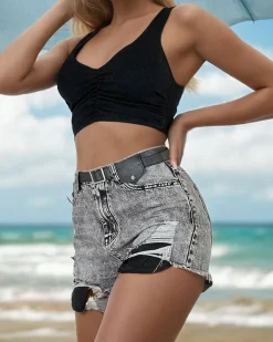 Krótkie Spodenki^Royalfashion Jeansowe damskie krótkie spodenki z przetarciami