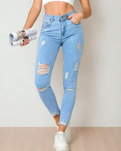 Jeansy^Royalfashion Jeansy damskie typu rurki z przetarciami