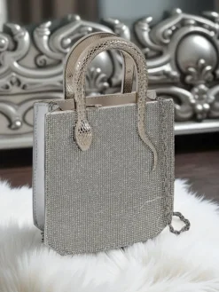 Małe Torebki^Royalfashion Kopertowa torebka damska z cyrkoniami i rączkami węża Snake Glam srebrny