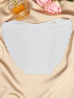 Figi^Royalfashion Laserowo cięte Majtki damskie typu figi z ozdobnymi paseczkami Edge Chic biały