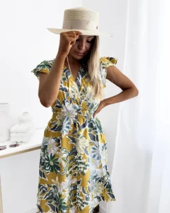 Sukienki Letnie|Sukienki Krótkie^Royalfashion Musztardowa sukienka damska mini z printem w kwiaty Musztarda