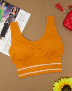 Sportowe^Royalfashion Musztardowy damski biustonosz sportowy Musztarda