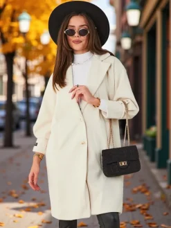 Kurtki / Marynarki / Płaszcze^Royalfashion Płaszcz damski beżowy