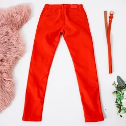 Spodnie|Spodnie Materiałowe^Royalfashion Pomarańczowe dziecięce spodnie z paskiem pomarańczowy