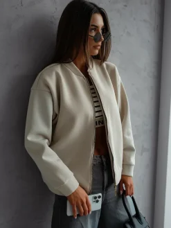 Bluzy^Royalfashion Rozpinana bluza typu bomberka beżowy