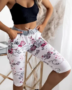 Spodenki 3/4|Krótkie Spodenki^Royalfashion Spodenki damskie biało- różowe o długości 3/4 biały