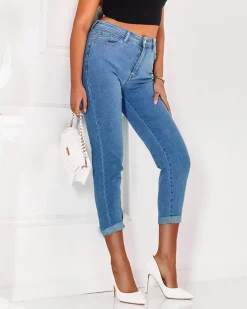 Jeansy^Royalfashion Spodnie damskie jeansowe typu mom jeans w kolorze niebieskim