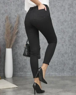 Jeansy^Royalfashion Spodnie damskie rurki w kolorze czarnym